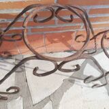 Wrought iron plant holders