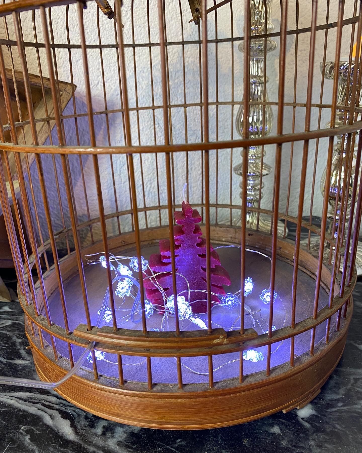 Old bird cage made of bamboo and wood