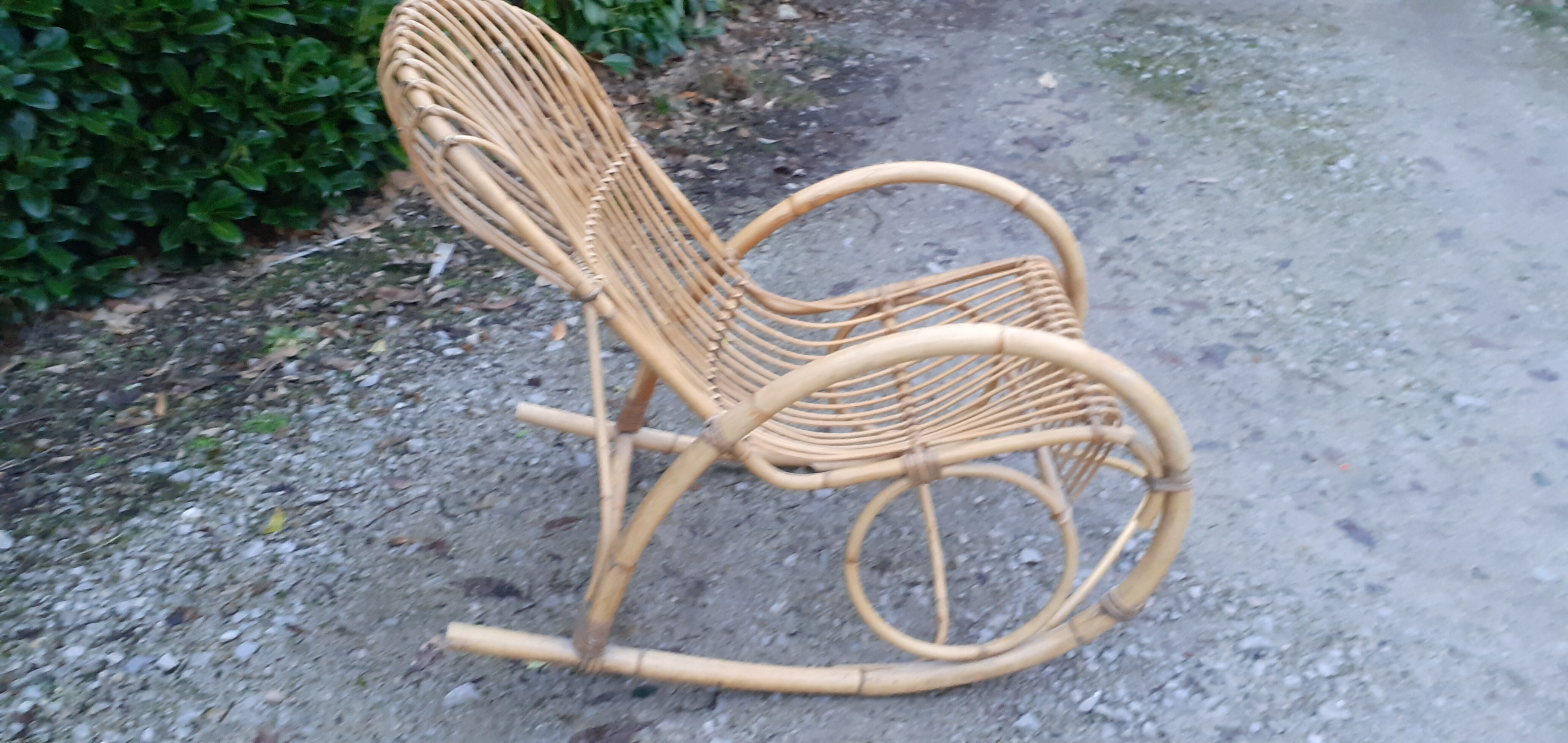 Rocking-chair rocking and armrests in vintage 60 year rattan