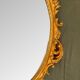 Beautiful Baroque Style Oval Decorative Mirror - Gilded with gold leaf with a Beautiful Patina