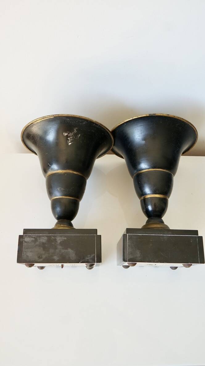 Pair of Art Deco enamelled brass casseroles, black and white marble base