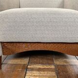 Pair of armchairs in carved wood and vintage fabric