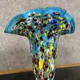 Venice circa 1980: Large "octopusy" vase in millefiori glass with a blue background
