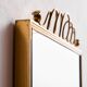Metal and brass framed mirror