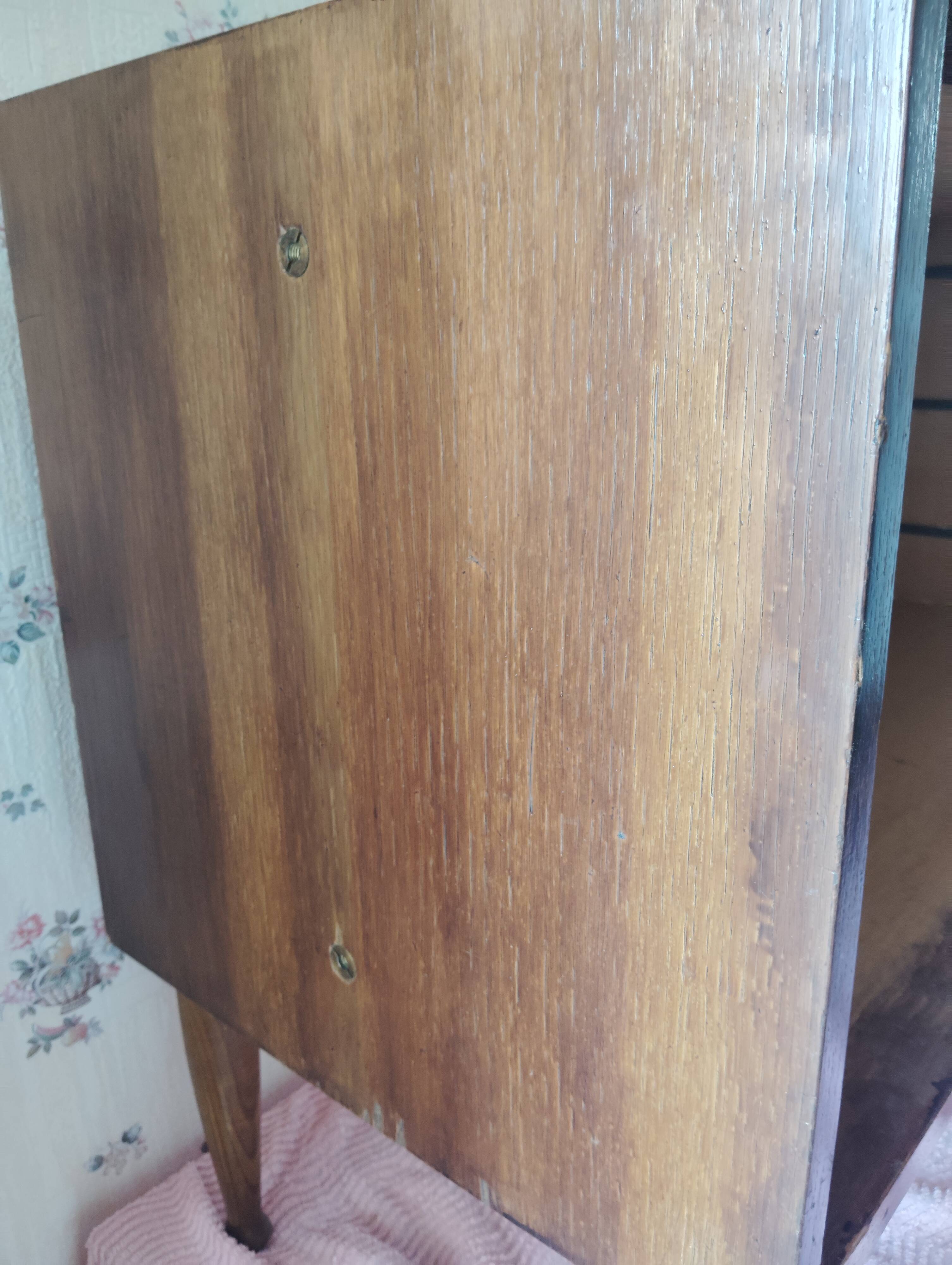 Vintage commode with tapered legs.
