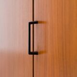 1960s walnut two-door cabinet.