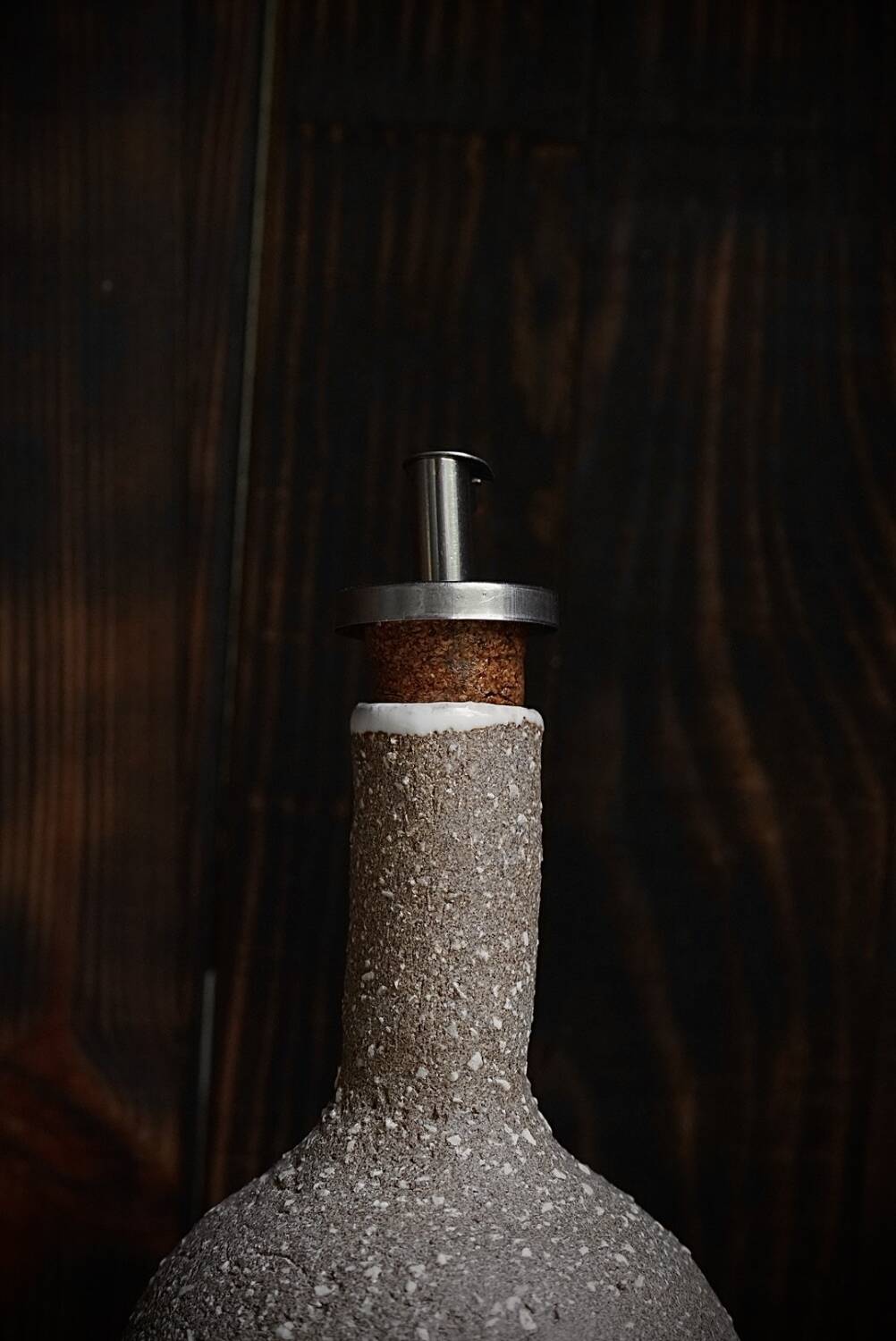 Ergonomic stoneware oil bottle