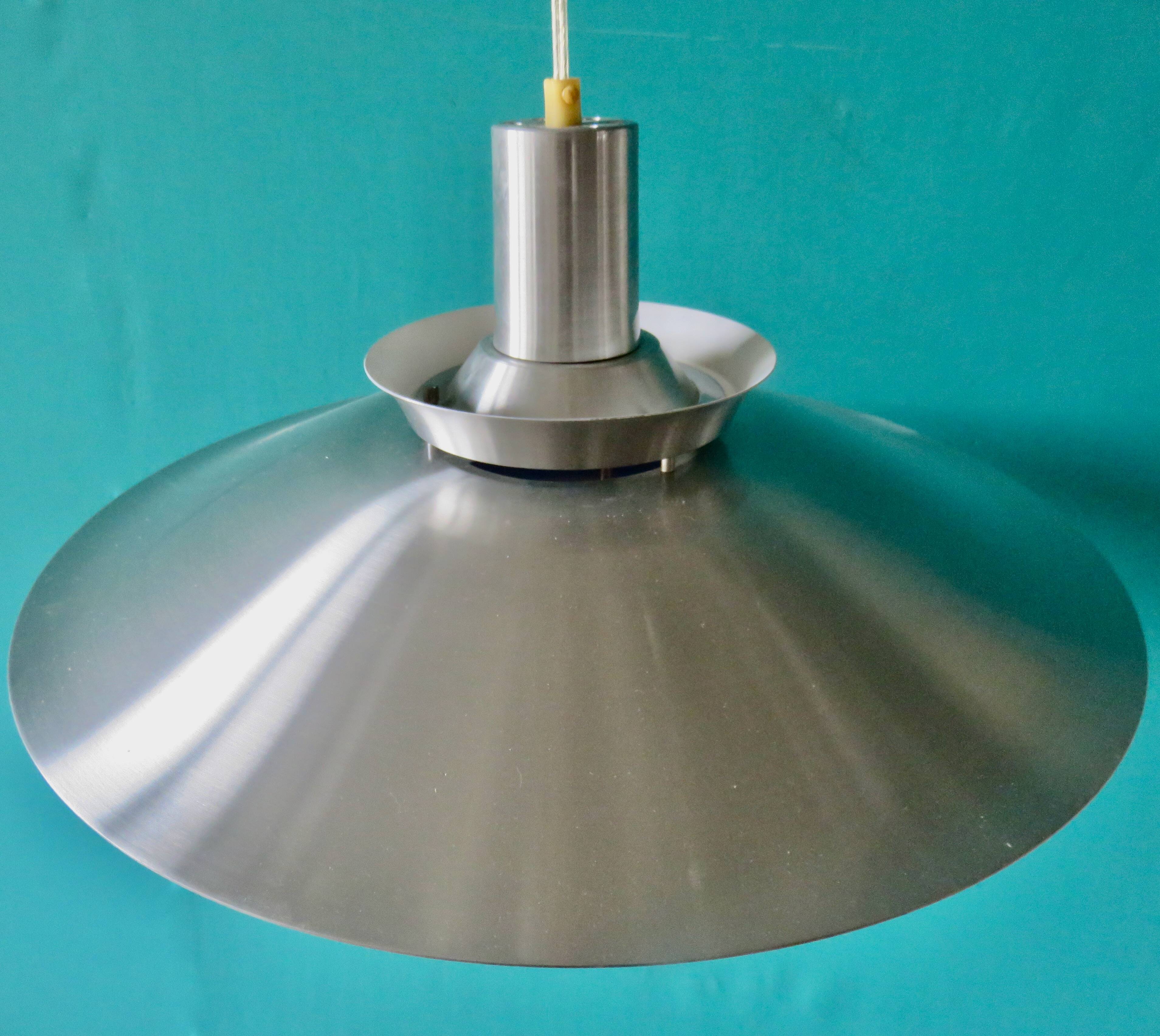 Suspension in brushed aluminum, interior in 3 colors. Denmark 1970