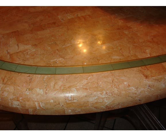 Ovoid table in pink and green travertine, circa 1975
