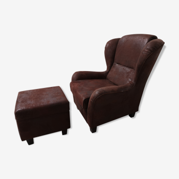 Large armchair with footrest