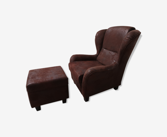 Large armchair with footrest