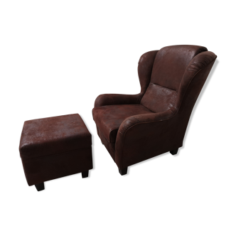 Large armchair with footrest