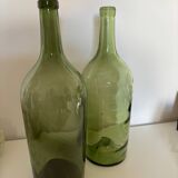 Pair of large antique blown glass bottles