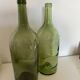 Pair of large antique blown glass bottles