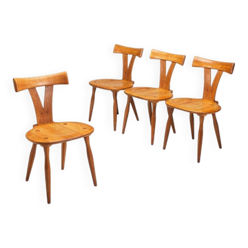 Ensemble de quatre chaises de salle à manger scandinaves en chêne, Danemark, 1960.