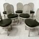Set of seven Louis XVI style chairs in patinated beech, 20th century.