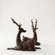 Solid bronze deer 20kg (1979), with period sales certificate.
