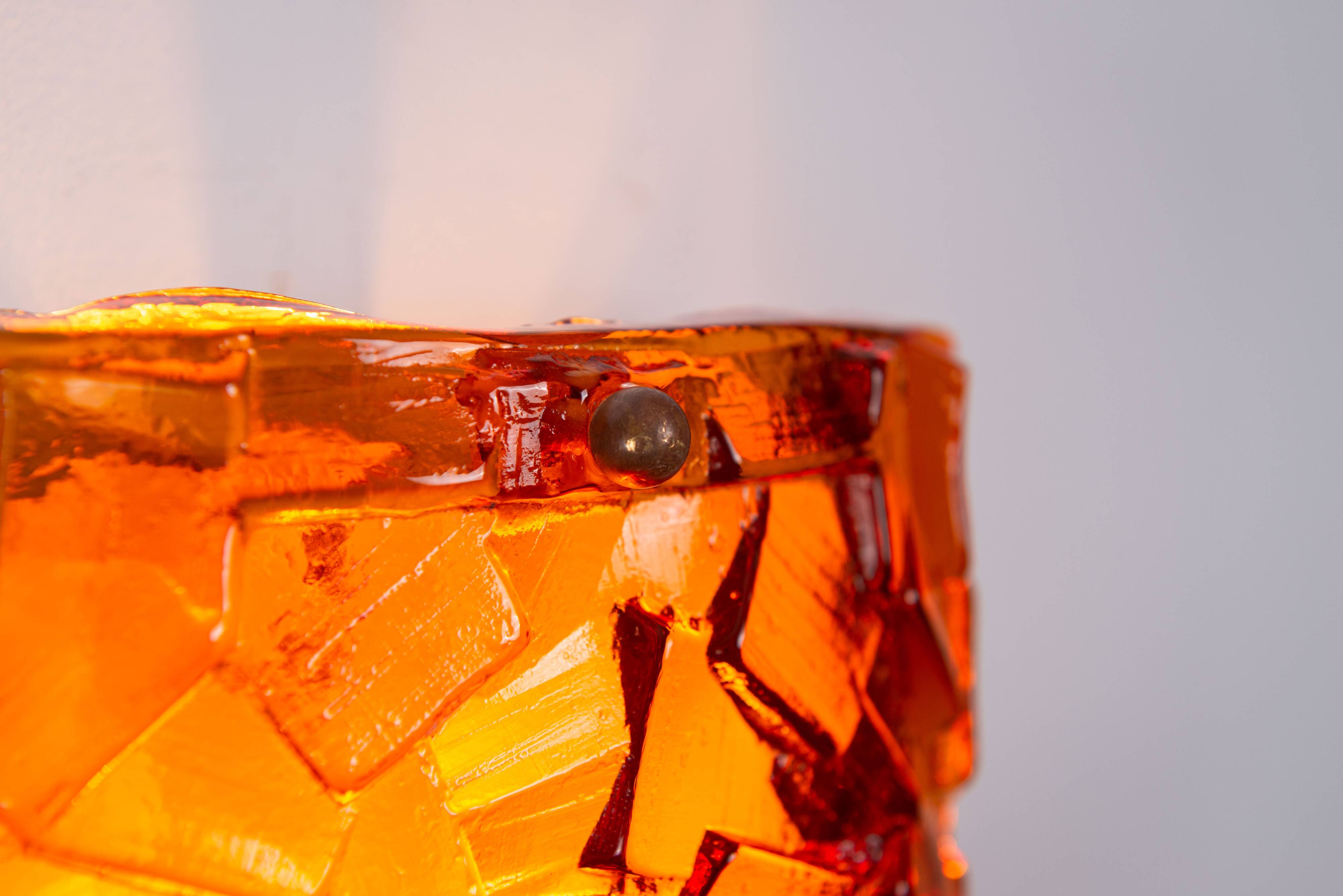 Vitrika Nybro amber coloured wall lamps