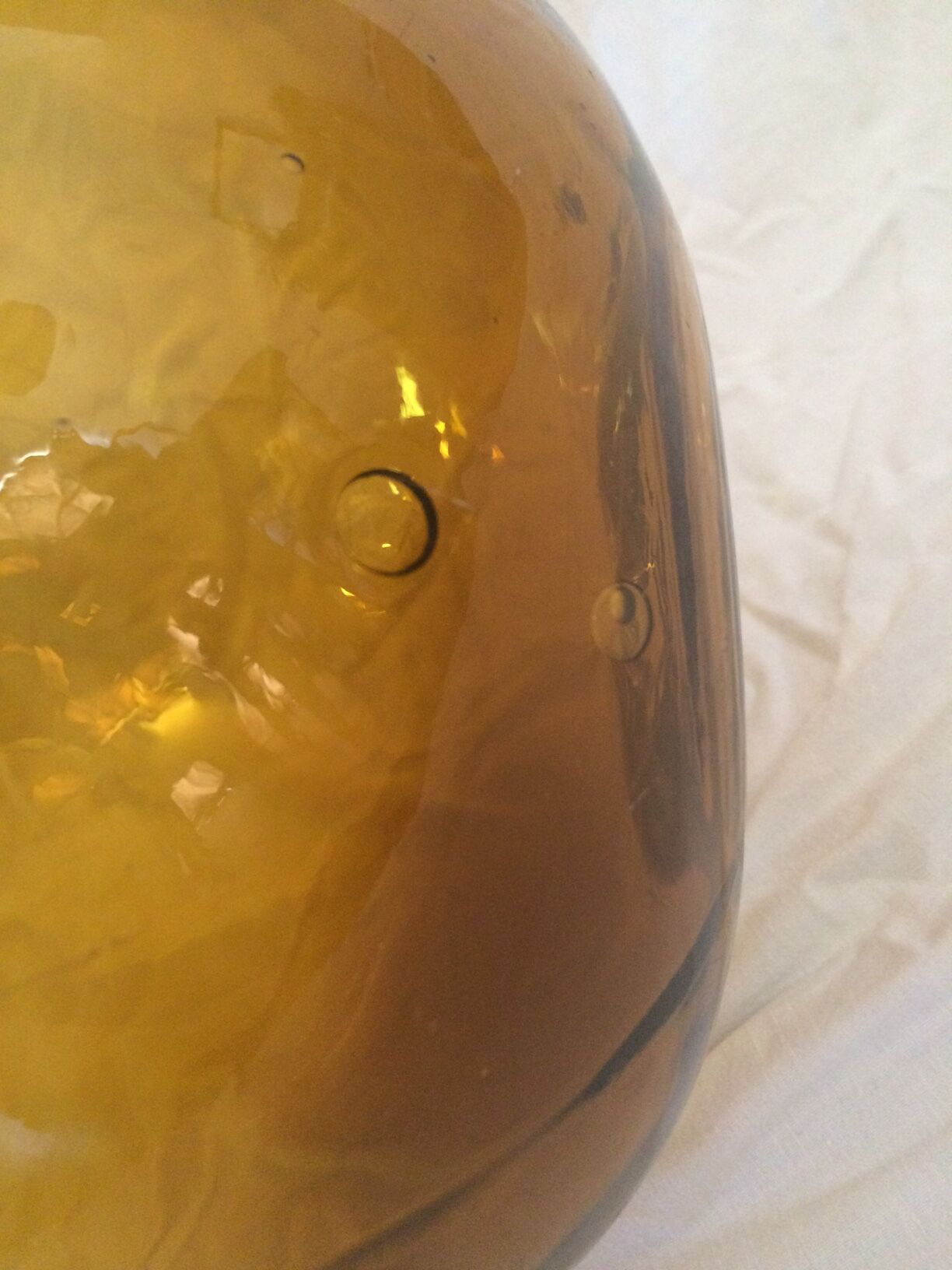 Transparent amber demijohn of 10L