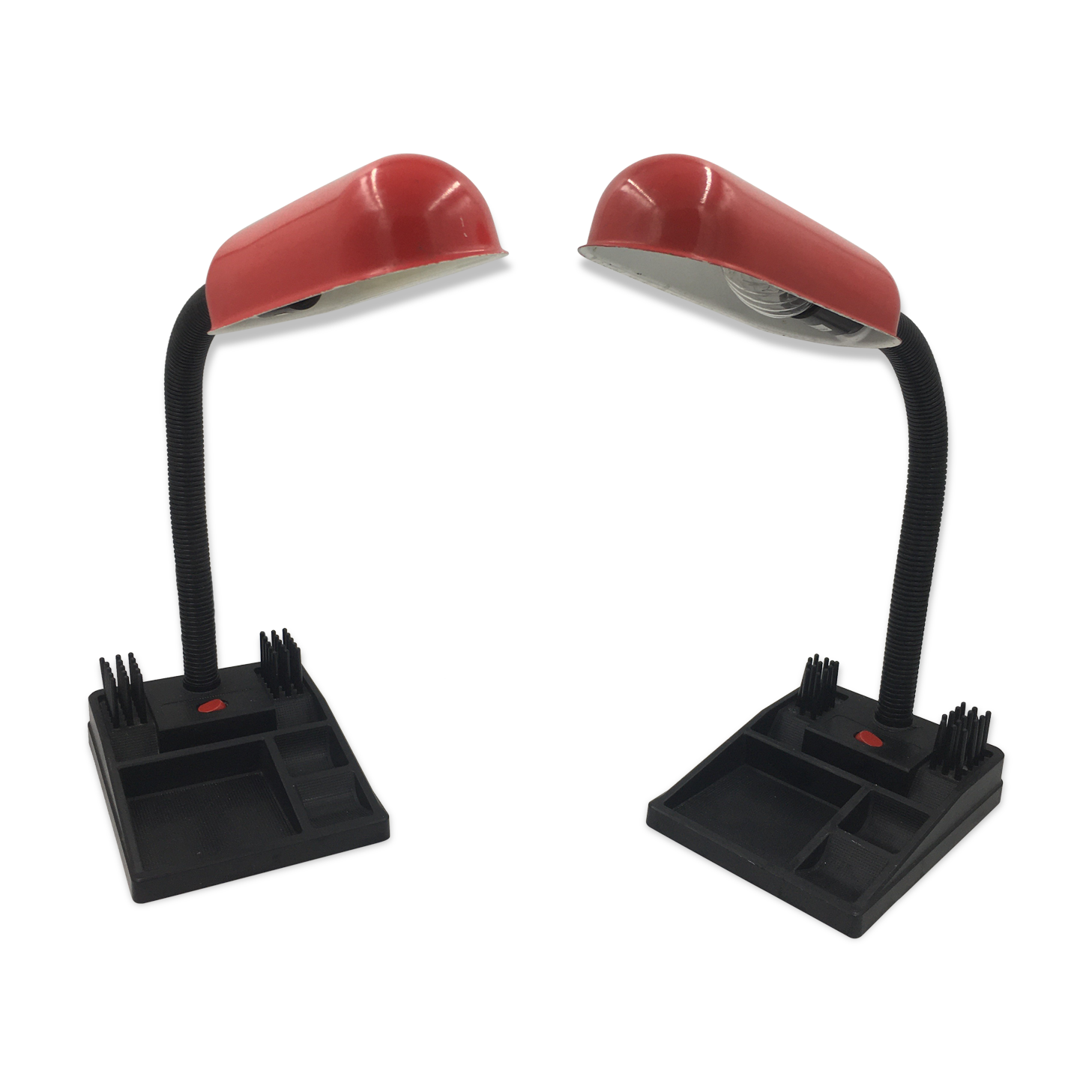 Duo of red and black flexible desk lamps with pencil holder