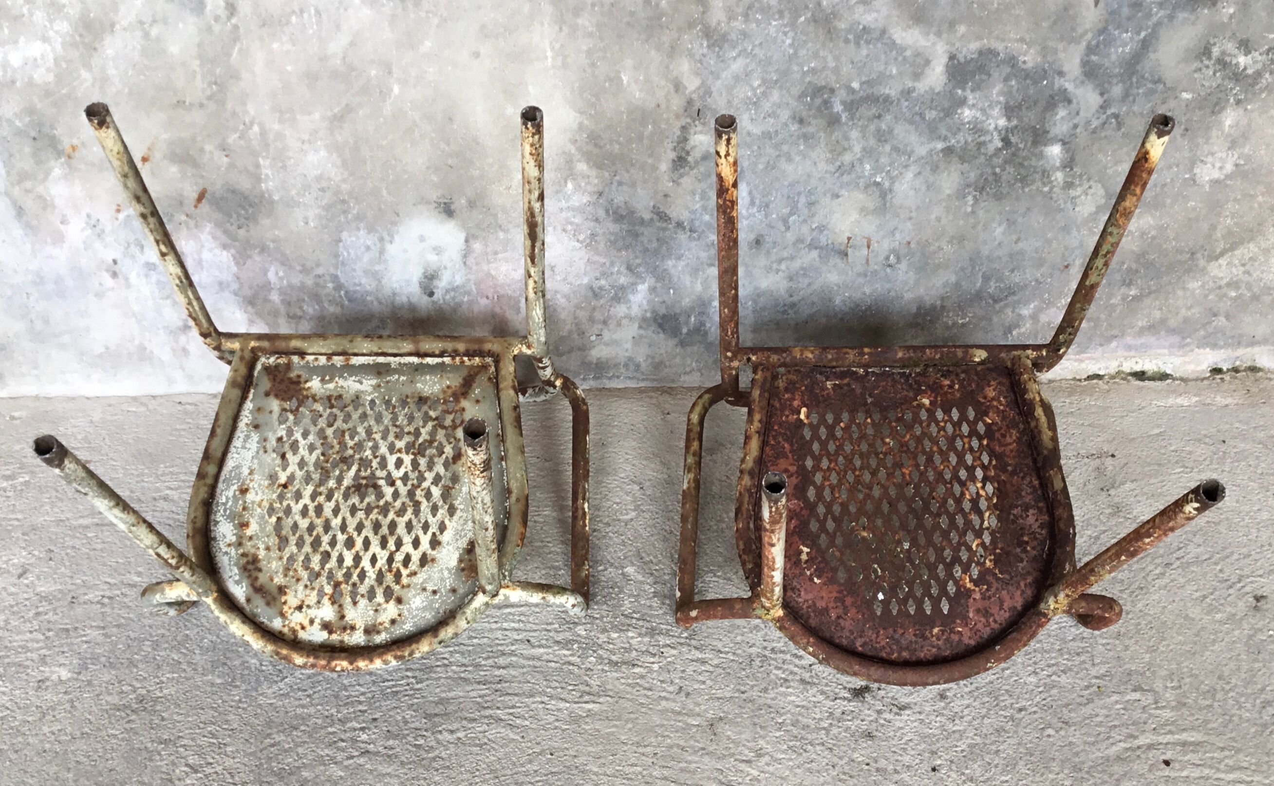 Pair of metal armchairs