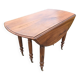 Large six-foot table with XIX century folding leaves in solid walnut Ø120 extendable to 330.
