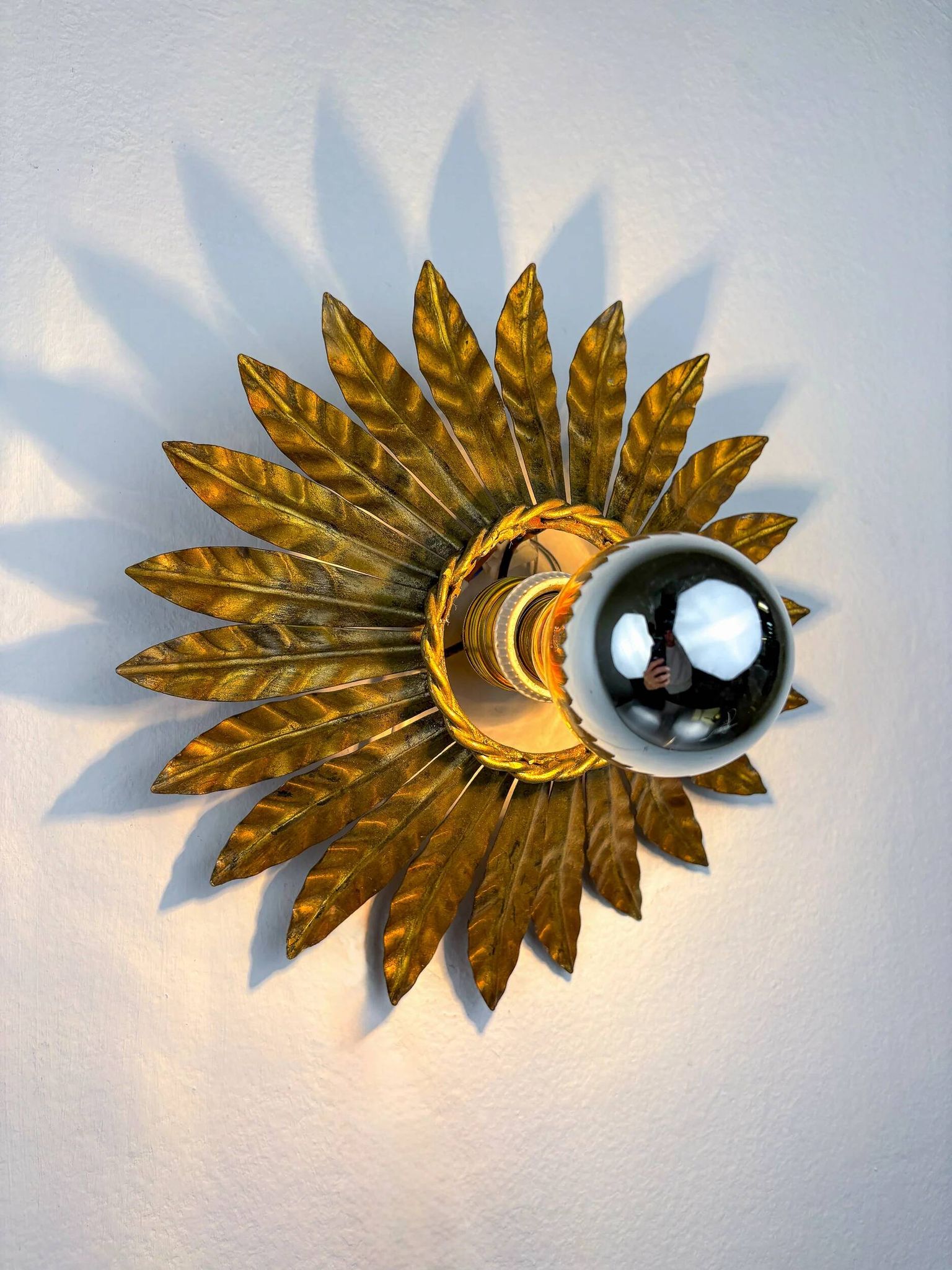 Spanish sunburst flush mount light fixture in gilt iron, circa 1960s