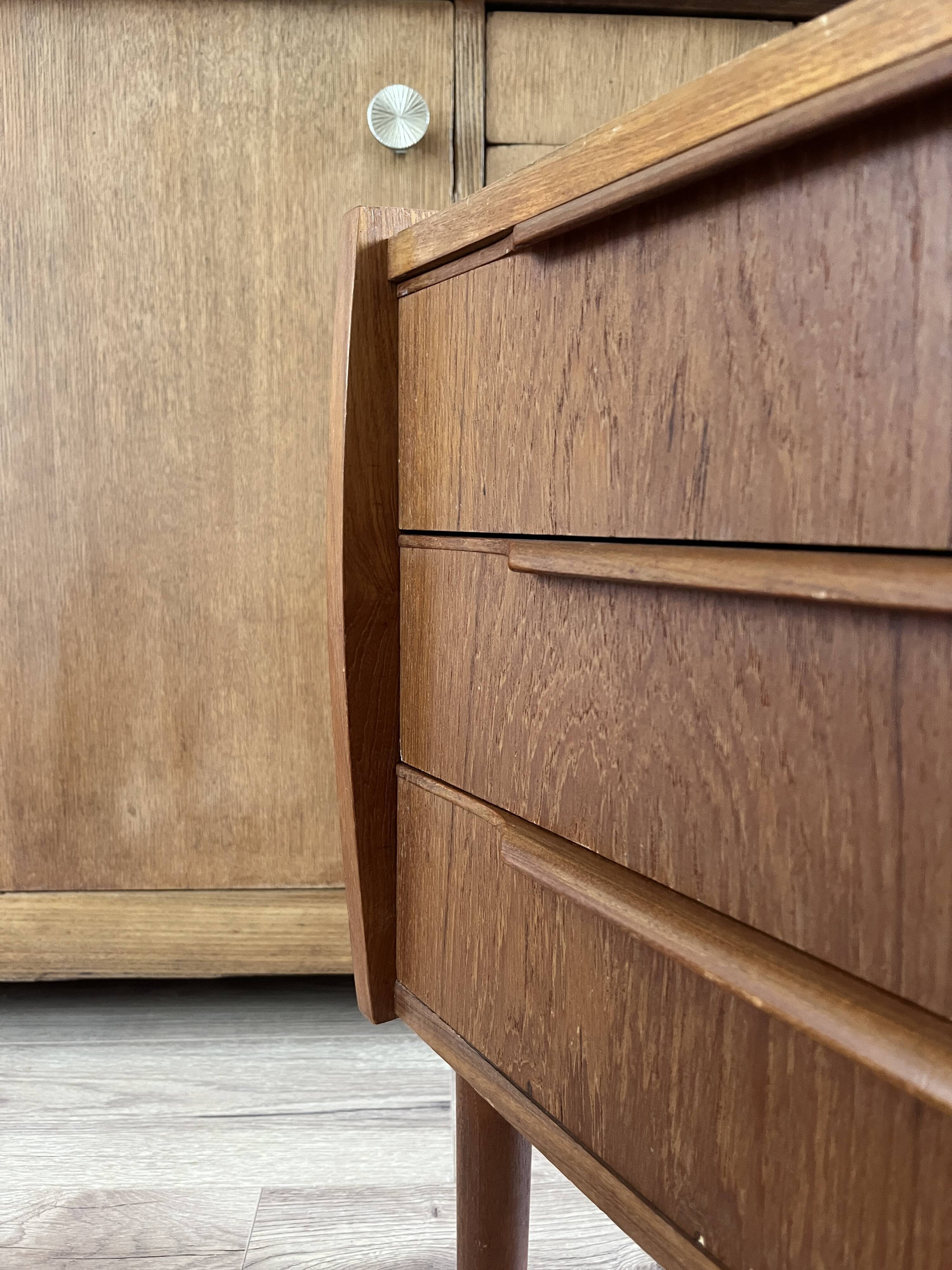 Vintage Danish teak commode with beautiful handles.