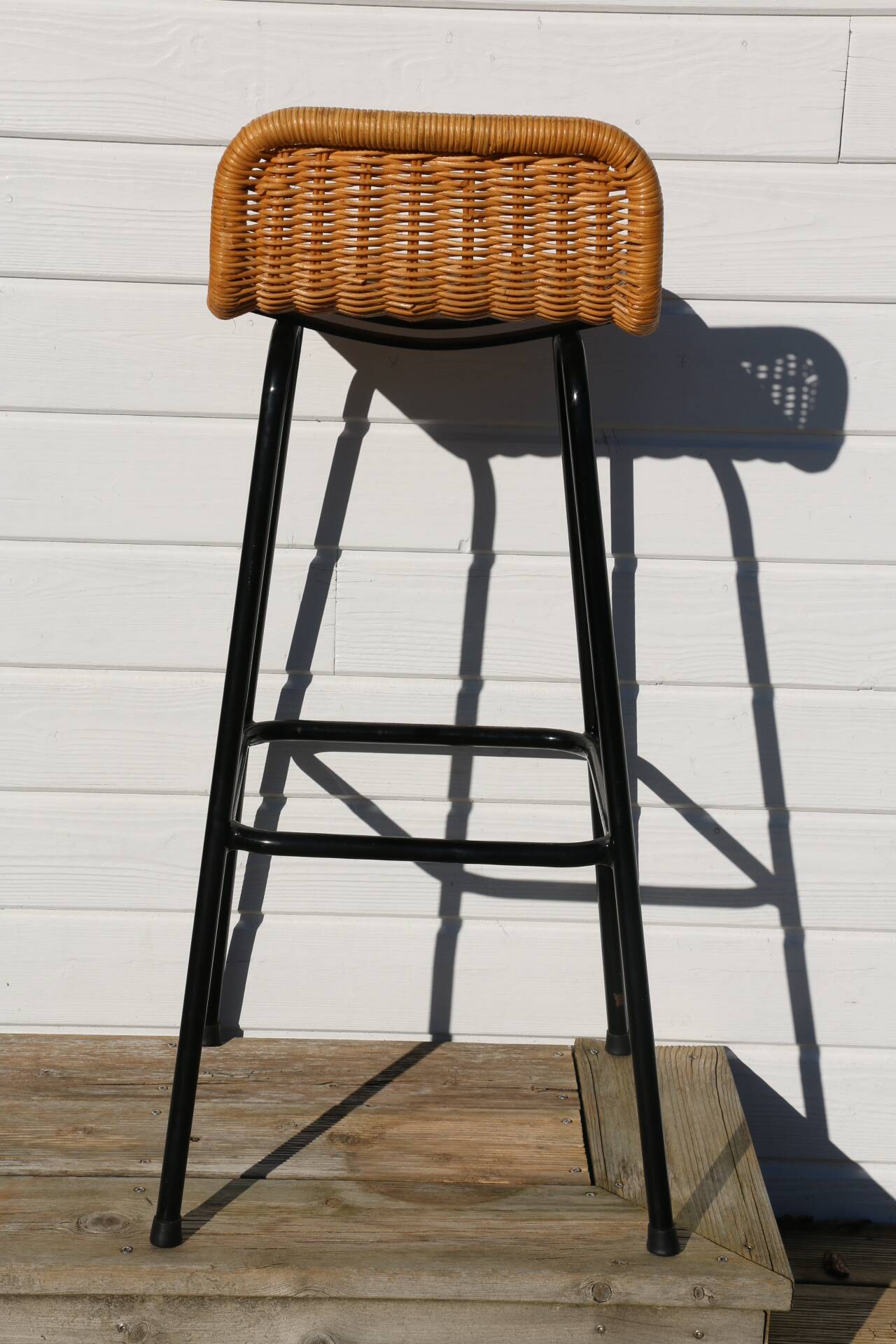 3 rattan and black metal stools dirk van sliedregt