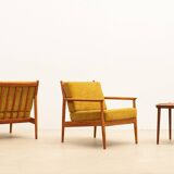 Pair of teak armchairs