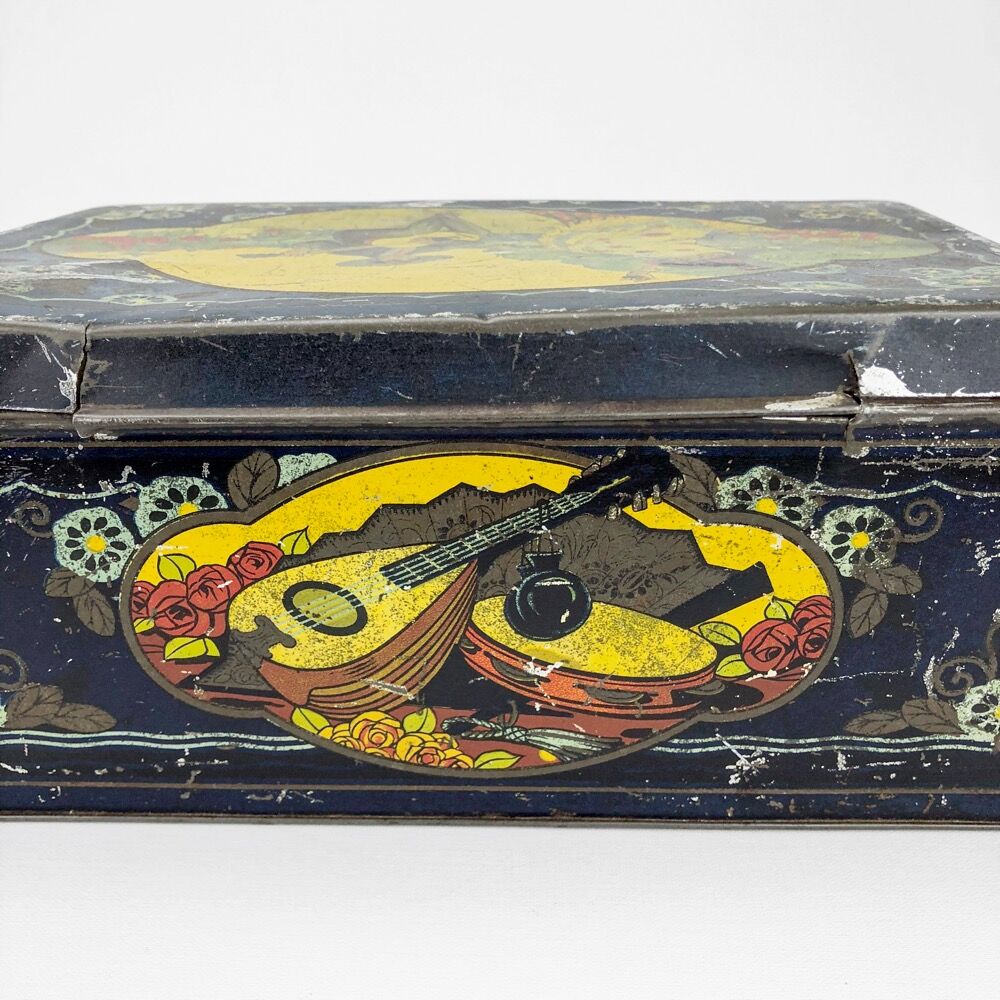 Antique lithographed tin biscuit tins