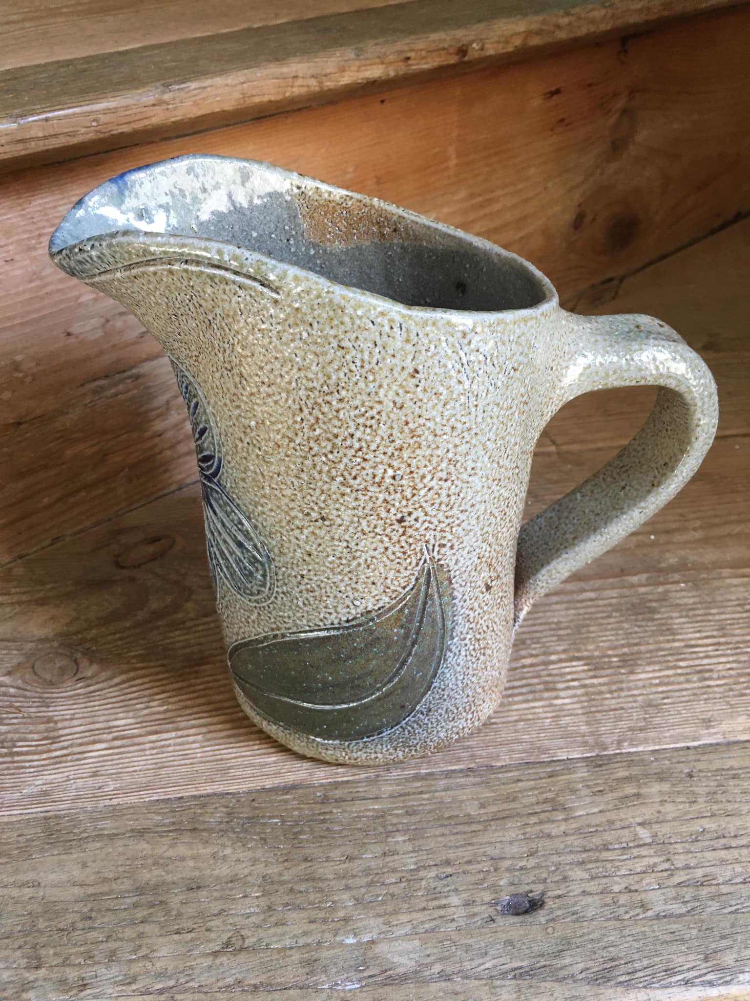 Pitcher in stoneware signed Jean Claude Monange, daisy motif yellow heart
