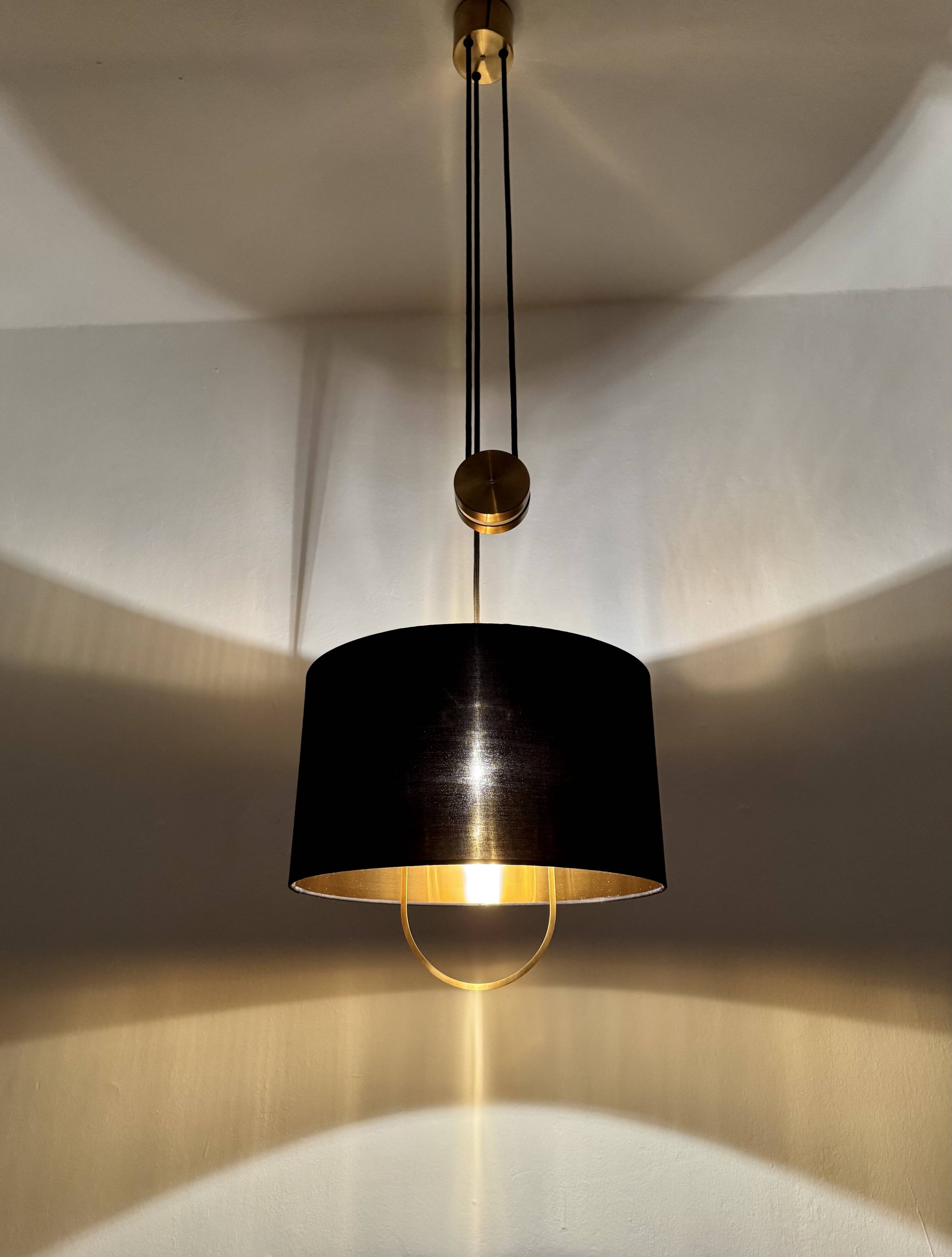 Lampe à pendentif Jo-Jo réglable par Florian Schulz