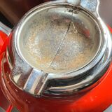 Red magazine ashtray on stand from the 70s