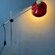 Adjustable red floor lamp in the style of Hoogervorst.