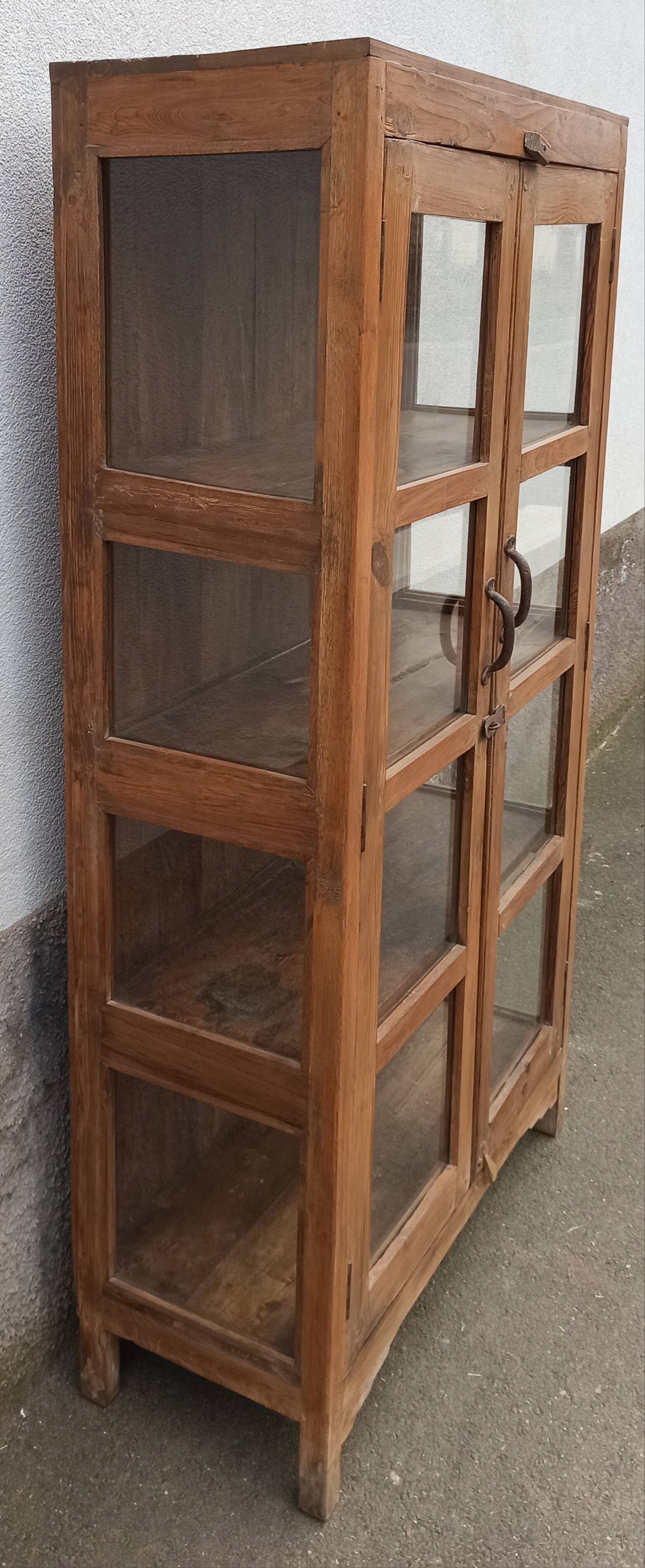 Old wooden cabinet display case with two doors