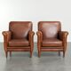 Comfortable set of sheepskin armchairs with and a timeless design