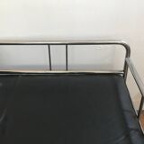 Sofa and armchair in chrome metal and black leather