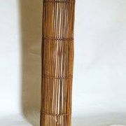 Mid-century rattan floor lamp, in the style of Louis Sognot.