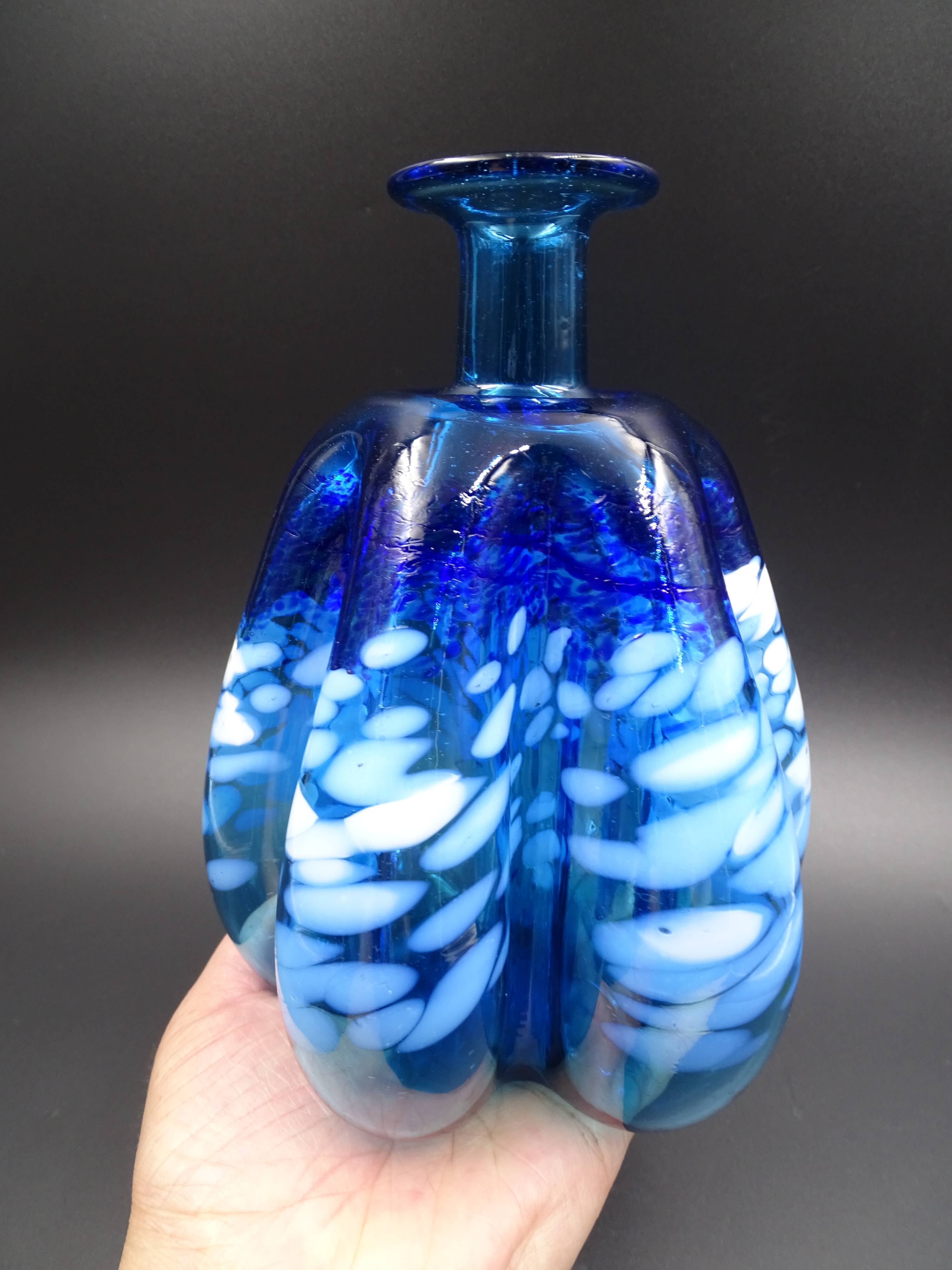 Blue glass vase and touches of white