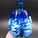 Blue glass vase and touches of white