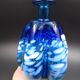 Blue glass vase and touches of white