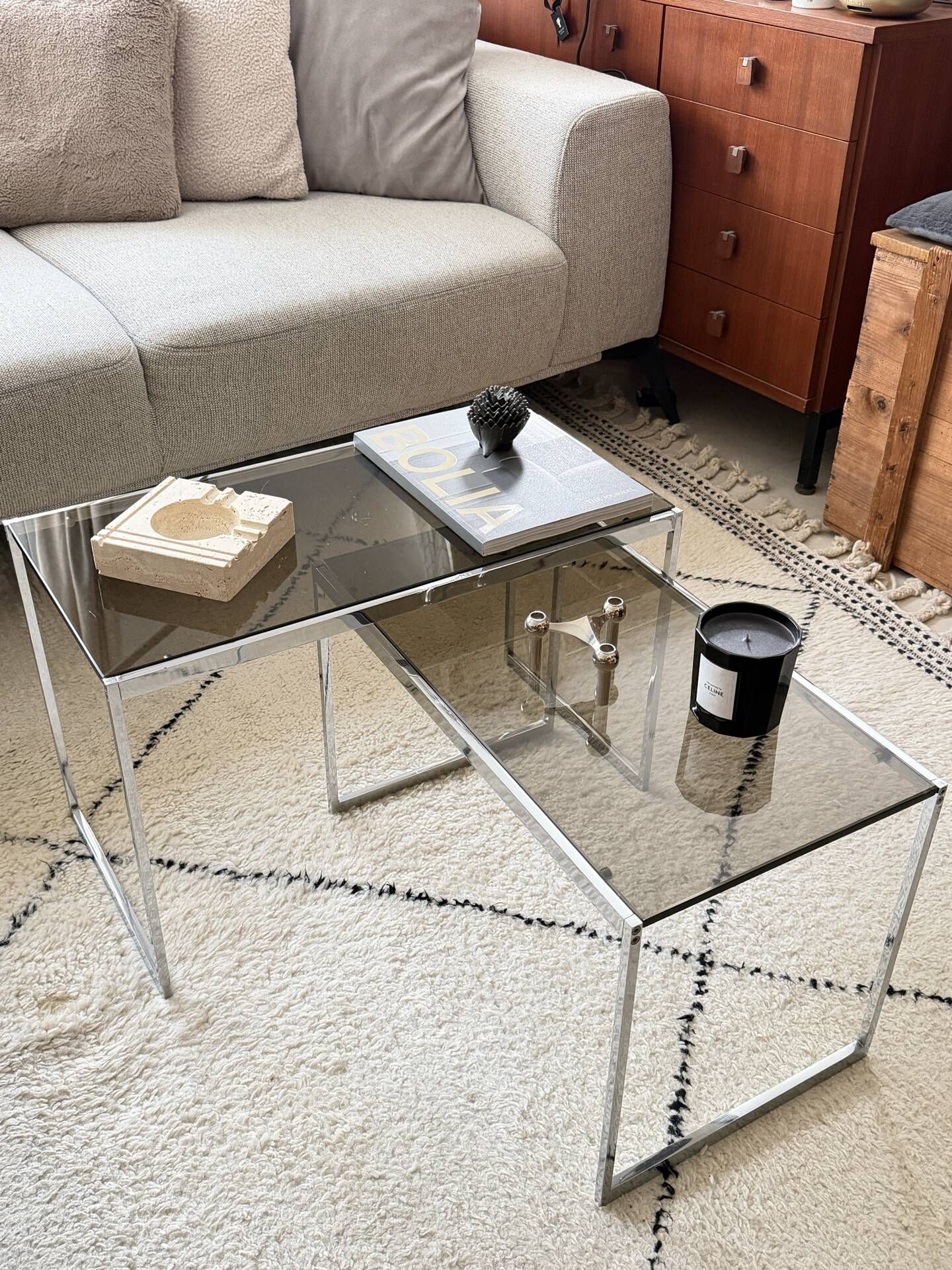 Set of 2 vintage nesting coffee tables in chrome metal and smoked glass.