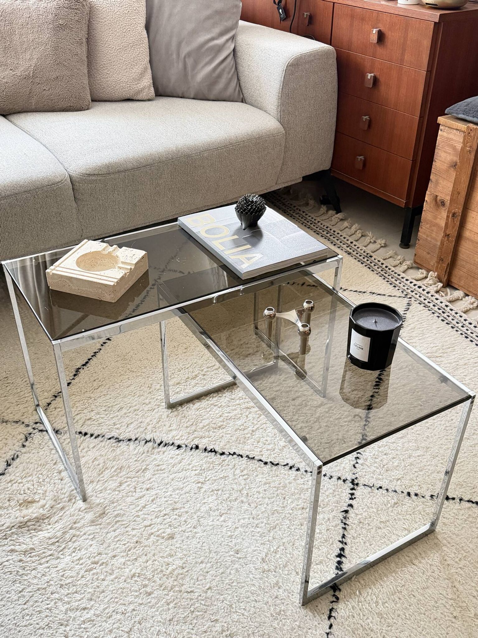 Set of 2 vintage nesting coffee tables in chrome metal and smoked glass.