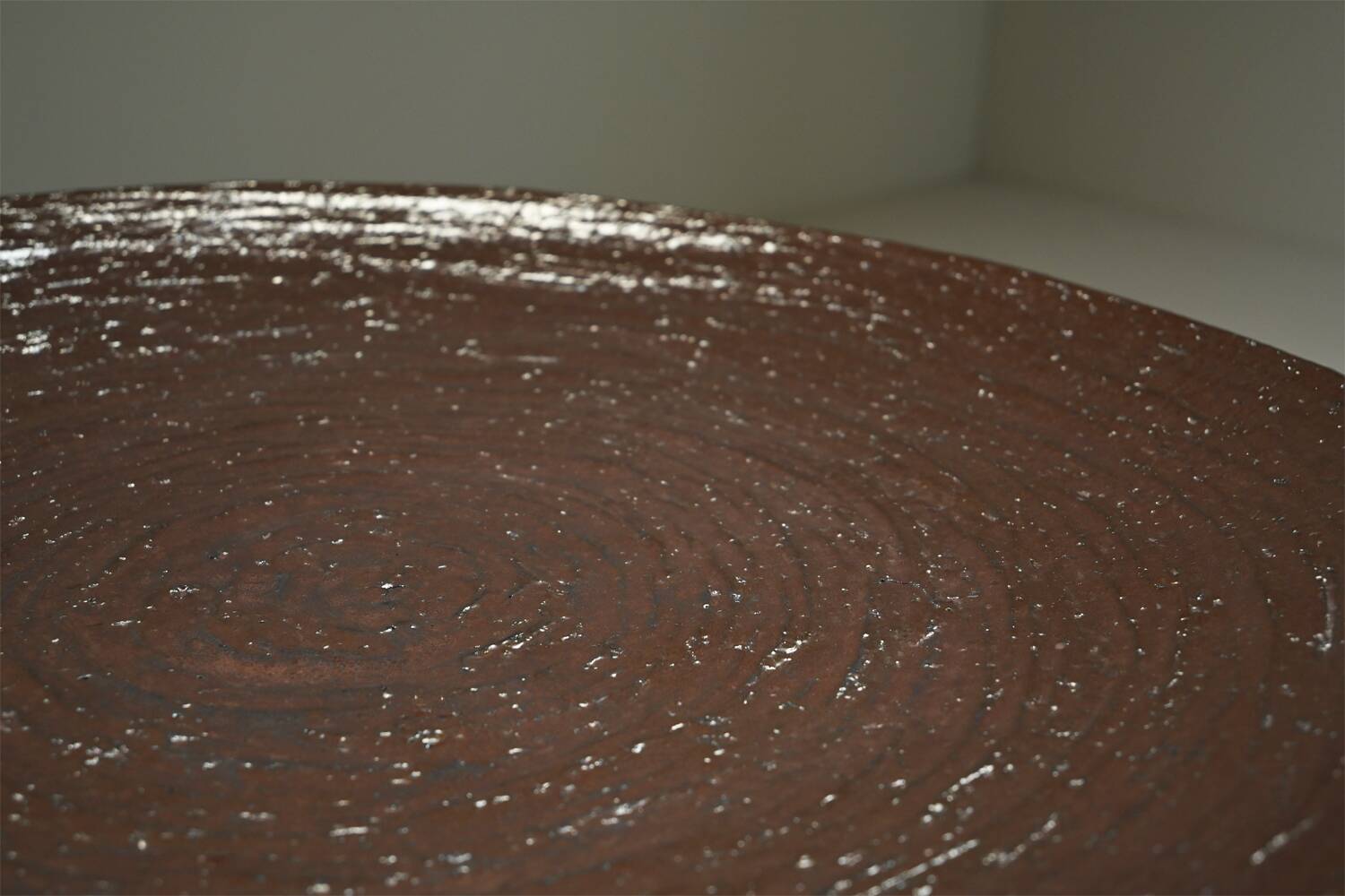 Large handmade metallic glazed ceramic bowl, circa 1980s–1990s.