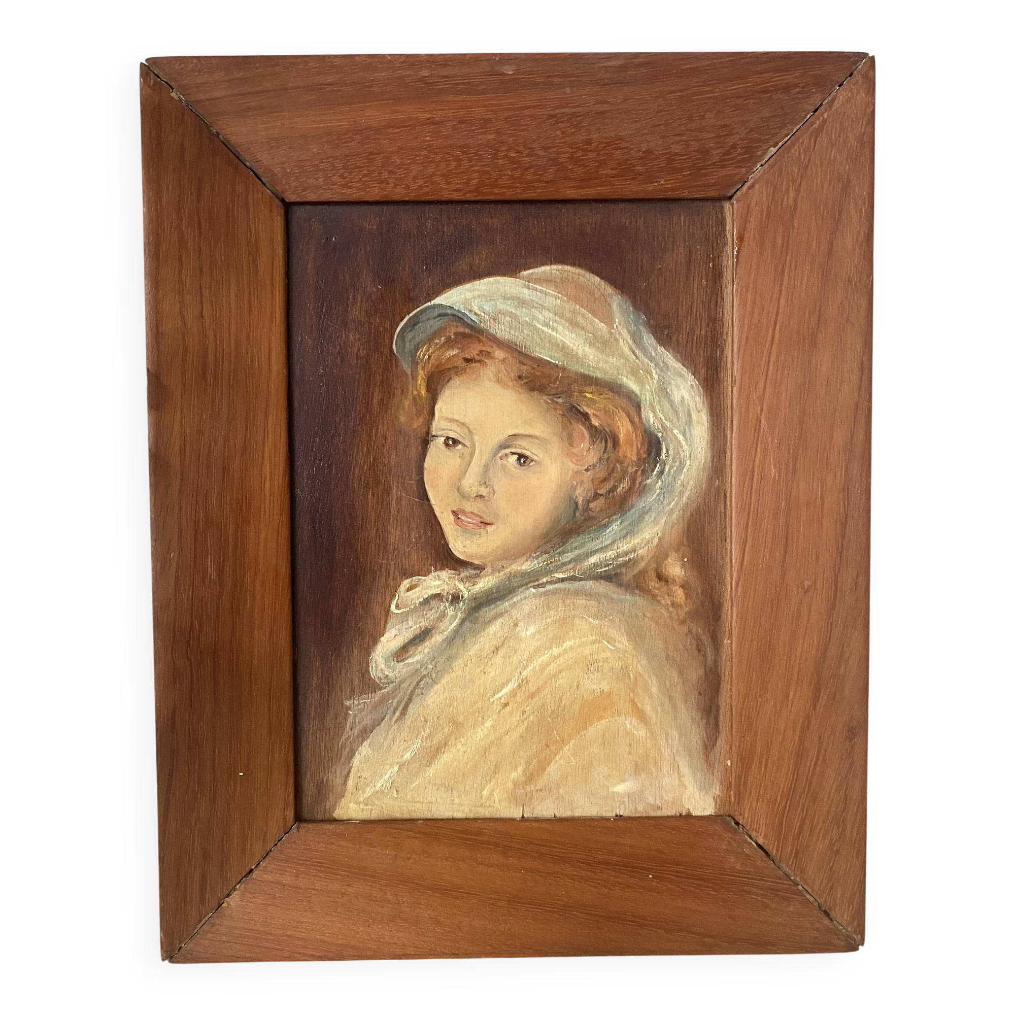 Old oil portrait on wood of a young woman