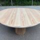 Scandinavian round dining table with a central base, stripped, made of solid raw wood, 90.