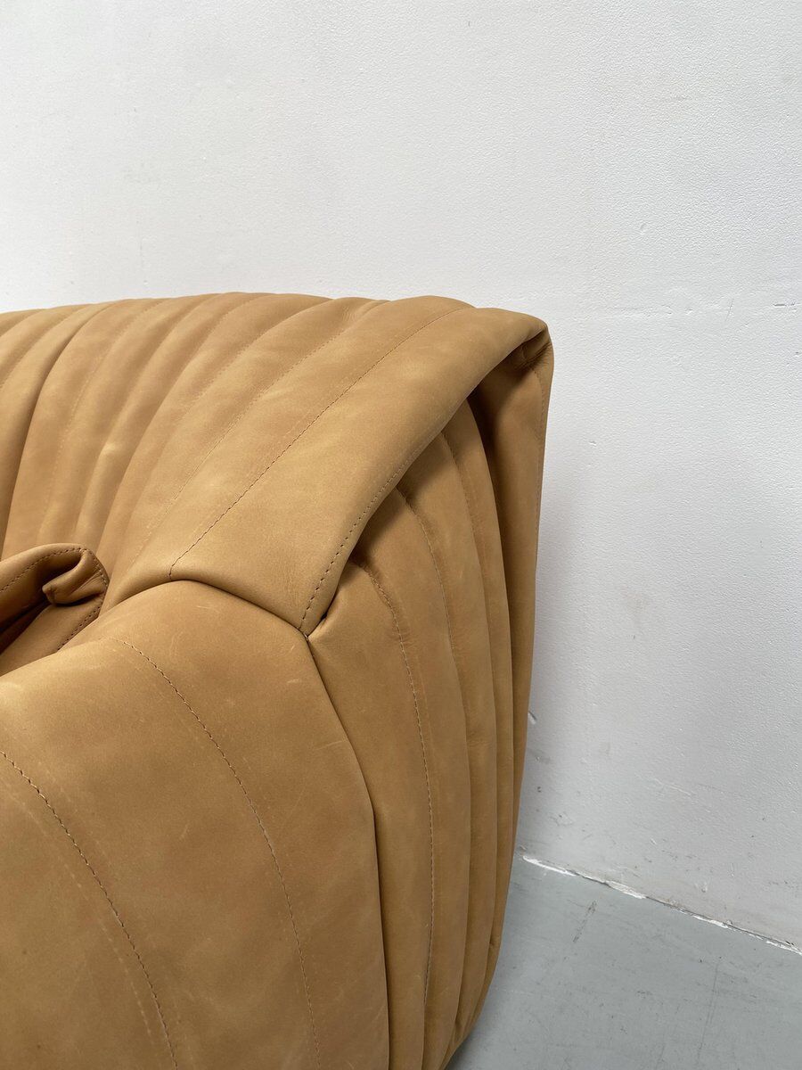 Sandra chair in camel leather by Annie Hiéronimus for Cinna/Ligne Roset.