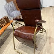 Reclining armchair in brown leather with tubular frame – Italy – 1960s/1970s