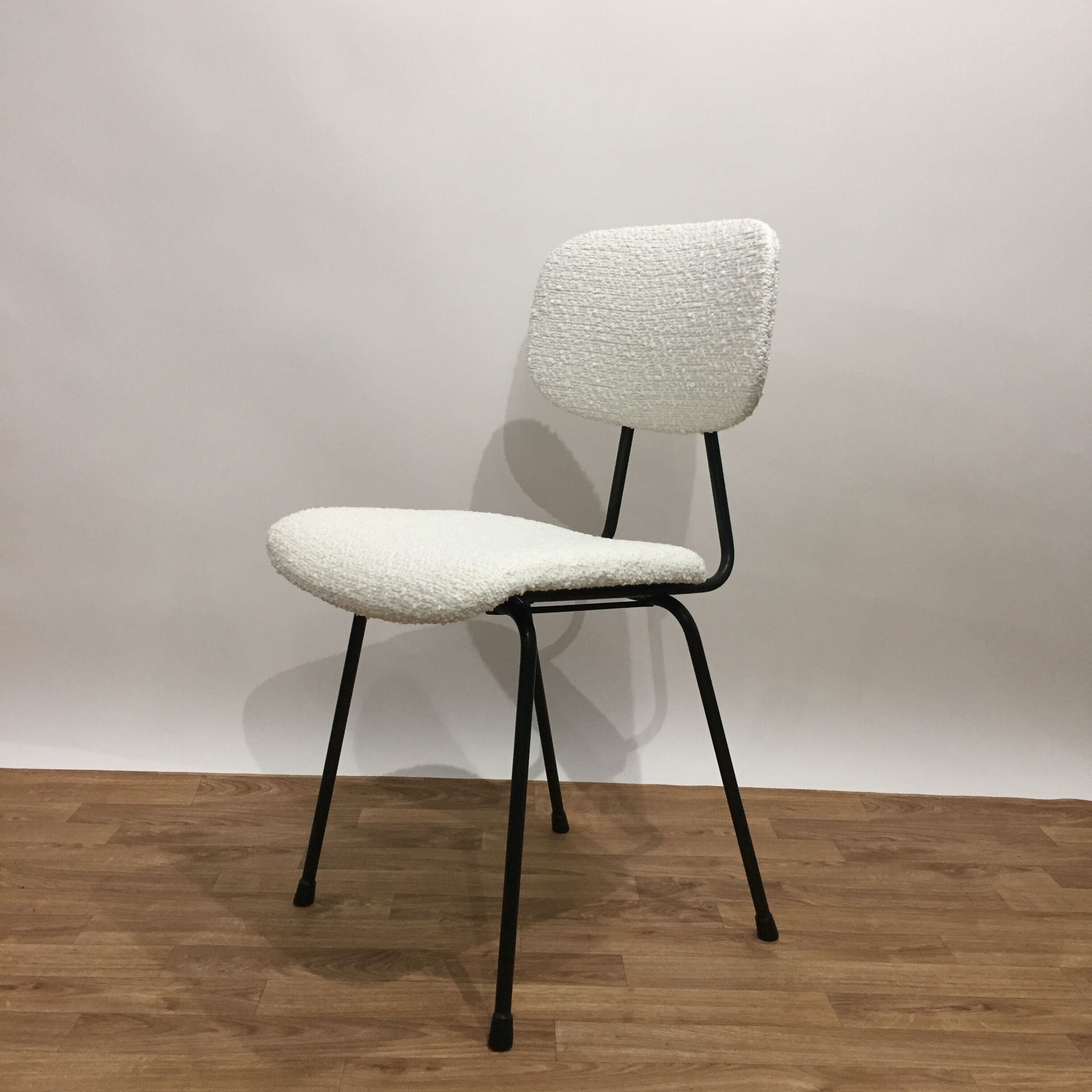 Series of 4 Kembo chairs reupholstered loop